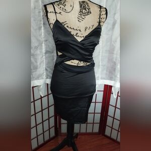 NWT. Black cut out cocktail dress. Size small
